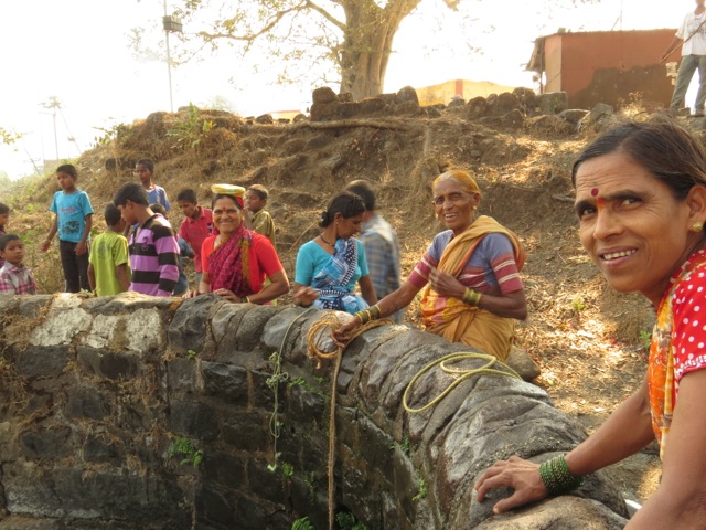 Women drawing water at the village well